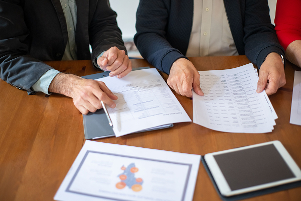 office-workers-looking-at-documents-during-a-business-meeting